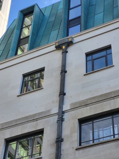Ornamental lead rainwater hopping head and lead rainwater pipes for Brewers hall in London