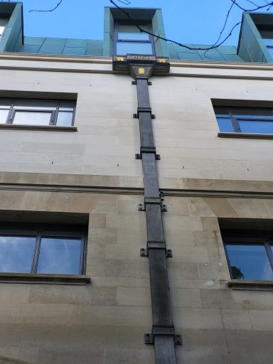 Ornamental lead rainwater hopping head and lead rainwater pipes for Brewers hall in London