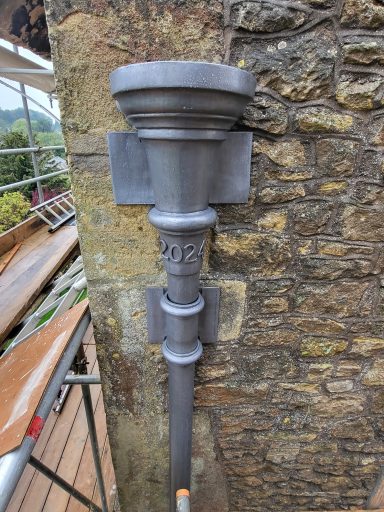 Bossed lead rainwater hopper head with date 2025