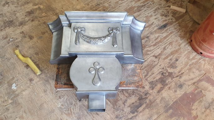 Ornamental lead rainwater hopping head for a listed building in Grosvenor Square in London