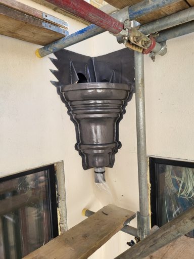 Bossed lead hopper head for a property in Eaton Square in London