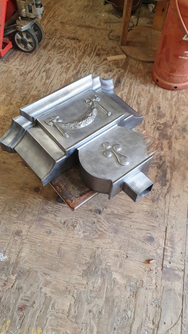 Ornamental lead rainwater hopping head for a listed building in Grosvenor Square in London