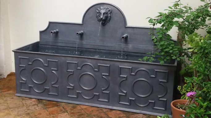 Lion and canon fountain spout water lead feature