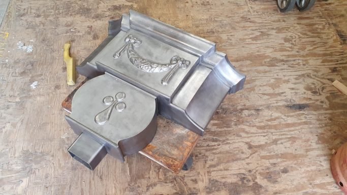 Ornamental lead rainwater hopping head for a listed building in Grosvenor Square in London